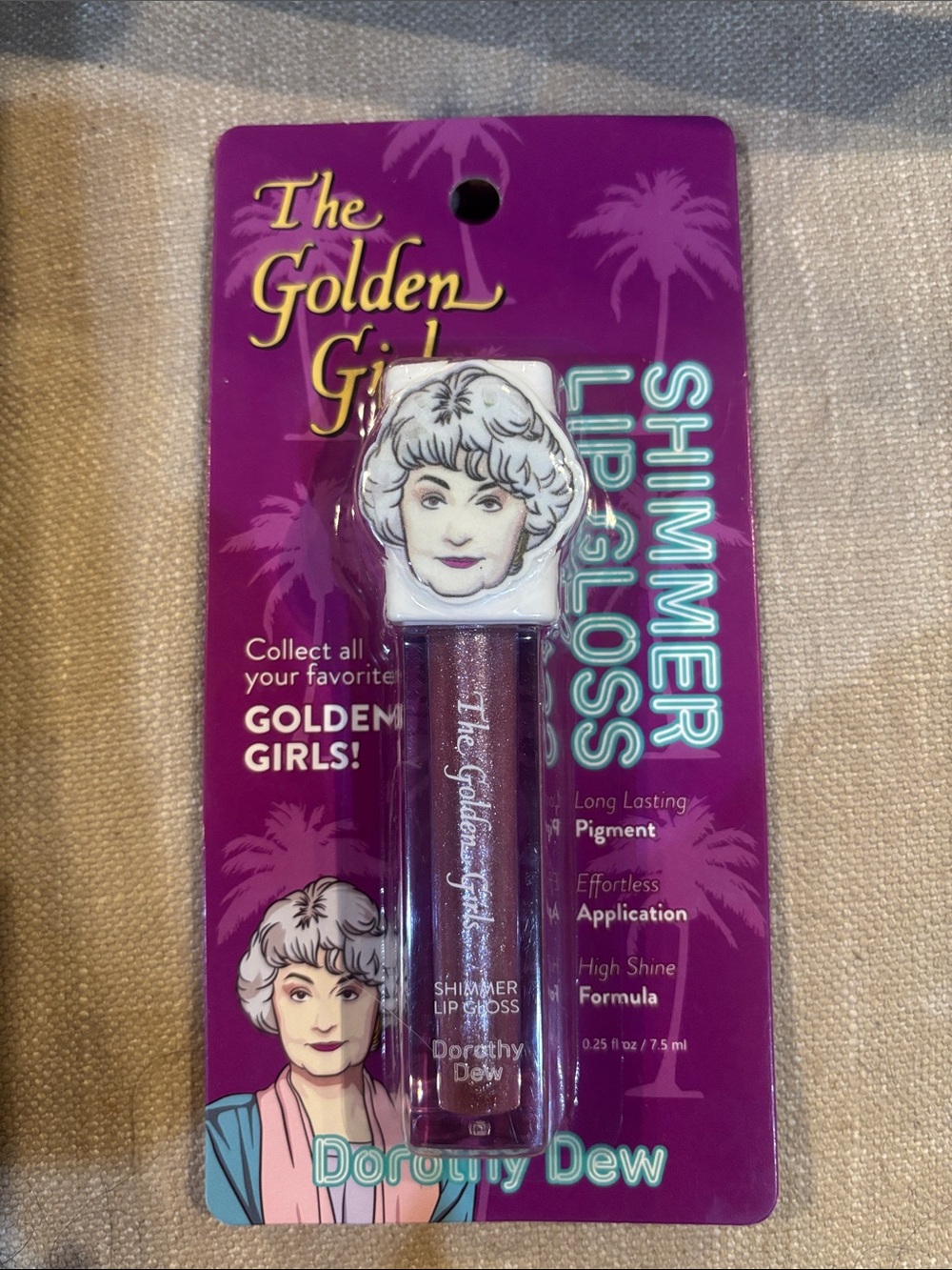 The Golden Girls Dorothy Dew Shimmer Lip Gloss - Pink Sparkle